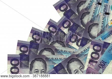 100 Philippine Piso Bills Lies In Different Order Isolated On White. Local Banking Or Money Making C