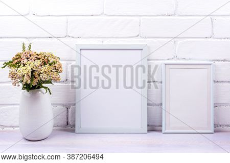 Two White Poster Frames Mockup With Pink Yarrow