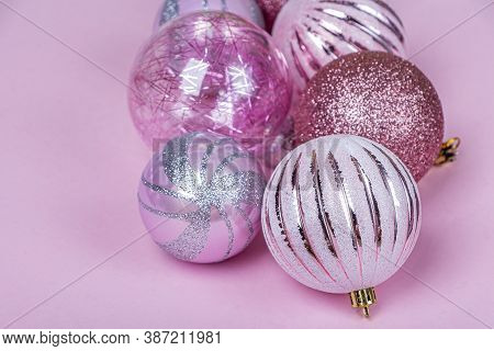 Christmas Composition. Set Of Christmas Pink Decorations, Shiny Balls On Pastel Background. Mock Up 