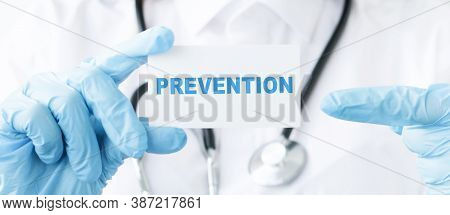 Prevention Text On Card In The Hands Of A Doctor. Healthcare Or Prevention Concept.