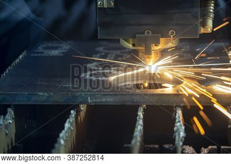 Close-up Scene Of Gas Cutting Machine Cutting  The Metal Plate. The Hi-technology Sheet Metal Manufa