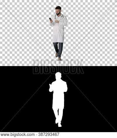 Smiling Mature Doctor Using Smartphone And Laughing, Alpha Chann
