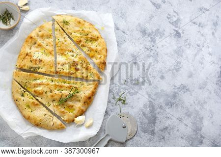 Garlic Foccacia Bread. Freshly Baked Flat Garlic Bread, Olive Oil And Herbs.