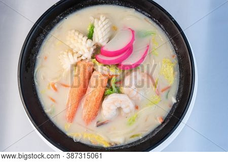 Overhead View Of Large Bowl Of Chanpon Full Of Squid, Crab, And Shrimp With Delicate Presentation Fo