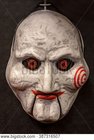 Saw Billy Puppet Face Mask isolated against black background