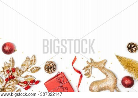 Christmas Background - Gift Box, Mistletoe, Fircones,reindeer And Christmas Balls In Golden And Red 