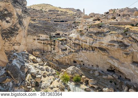 Panoramic View Of Hasankeyf Ancient Castle And The Citadel. Cave Houses And Historic Ruins In Easter