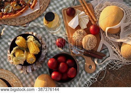 Picknick With Food And Fruits Outdoors In Nature