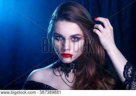 Vampire Halloween Sexy Woman With Dripping Blood On Her Lips