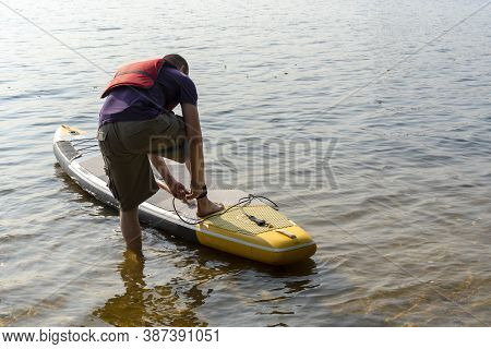 Standup Paddleboarding Are On The River Moscow, Strogino.