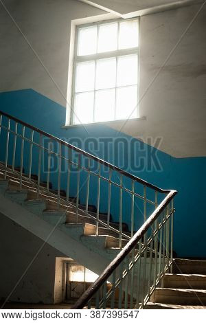 Brutalism In Architecture. Raw Concrete Steps Of Brutal Style Staircase. Concrete Prefab Stair. Blue