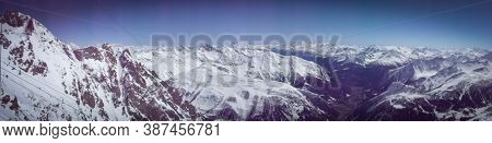 Panoramic View Of The Italian Alps With The City Of Courmayer At The Bottom In The Valley