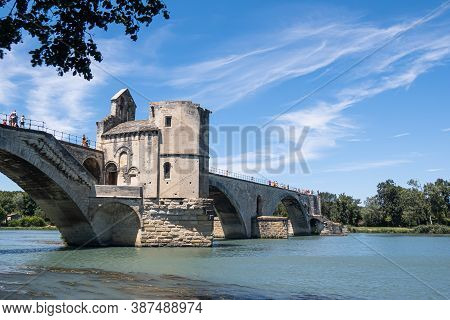 Avignon, France - July 7, 2020: The Pont Saint-benezet Also Known As The Pont Avignon Is A Famous Me