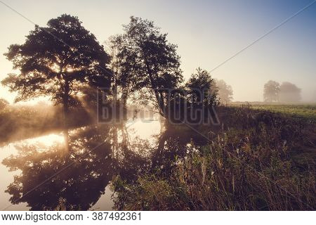 Morning Mist Above The River At The Sunrise