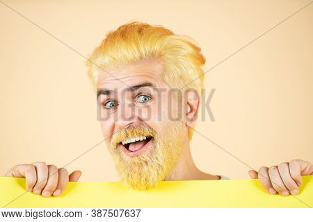 Funny Man Holding Empty Placard Board For Media Banner. Man Holding Empty Sheet Of A Paper. Man Offi