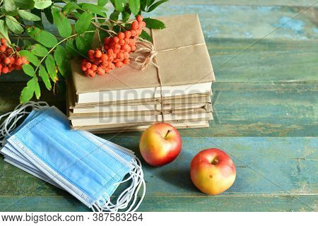 Happy Teacher's Day. Books, Rowan, Apple And Medical Protective Mask With Copy Space, Still Life.cov