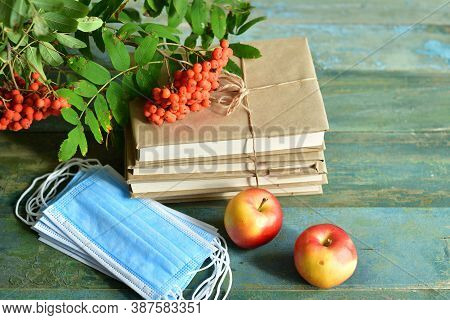 Happy Teacher's Day. Books, Rowan, Apple And Medical Protective Mask With Copy Space, Still Life.cov