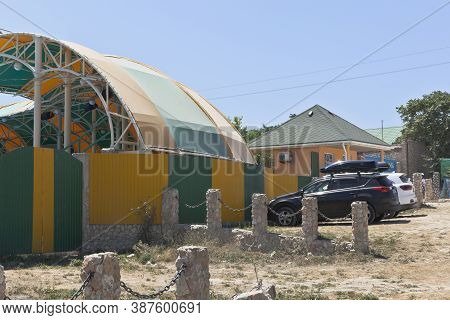 Chernomorsky District, Crimea, Russia - July 21, 2020: Dolphinarium At The Bolshoi Atlesh Cape Of Th