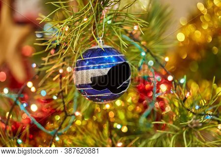 Detail Of Christmas Tree With A Broken Blue Glass Ball
