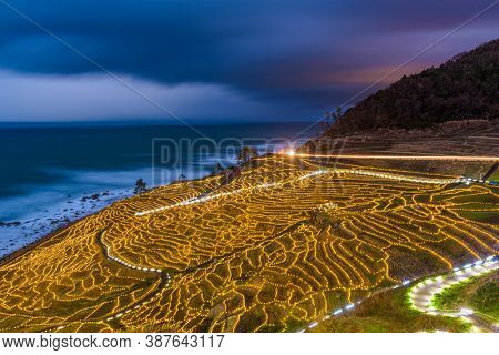 Wajima, Japan at Shiroyone Senmaida rice terraces night light up.