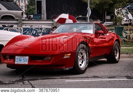 Toronto, Canada - 08 18 2018: Gorgeous Red 1981 C3 Chevrolet Corvette Coupe Oldtimer Car On Display 