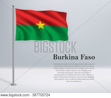 Waving Flag Of Burkina Faso On Flagpole. Template For Independen