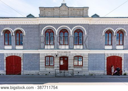 Visby, Sweden - July 27, 2020: Facade Front View Of The Old Beautiful Tullkammare Building With Blue