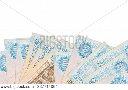 200 Ukrainian Hryvnias Bills Lies On Bottom Side Of Screen Isolated On White Background With Copy Sp