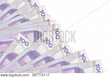 100 Philippine Piso Bills Lies Isolated On White Background With Copy Space Stacked In Fan Close Up
