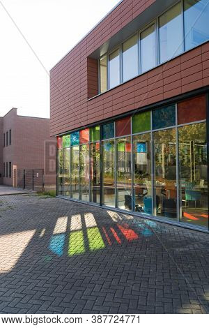 Exerior Of A Modern Office Building With Some Nice Colored Reflections