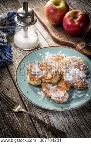 Sweet Pancakes Made Of Apple, Milk And Flour.