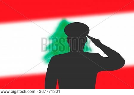 Solder Silhouette On Blur Background With Lebanon Flag.