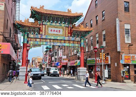 Philadelphia, Usa - June 11, 2013: People Visit Chinatown In Philadelphia. The Chinatown Gate Was Co
