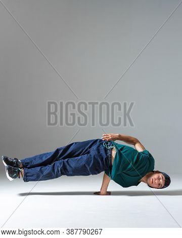Cool Guy Breakdancer Dancing On One Hand Isolated On Gray Background. Breakdance Poster
