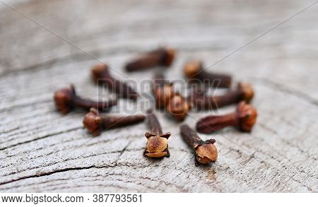 Cloves (flower Buds Of Syzygium Aromaticum). Clipping Paths, Shadow Separated On Wood ;herb For Heal