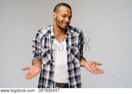 I Dont Know Gesture - Young Afrcian American Man Over Grey Background Being At A Loss, Showing Helpl