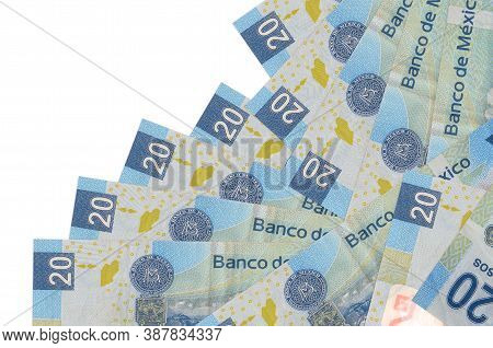 20 Mexican Pesos Bills Lies In Different Order Isolated On White. Local Banking Or Money Making Conc