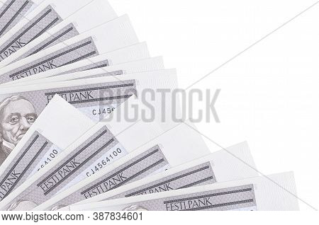 2 Estonian Kroon Bills Lies Isolated On White Background With Copy Space Stacked In Fan Close Up