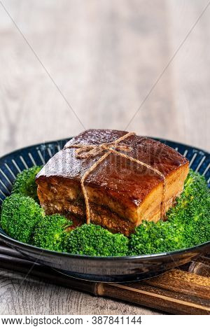 Dong Po Rou (dongpo Pork Meat) In A Plate With Green Vegetable, Traditional Festive Food For Chinese