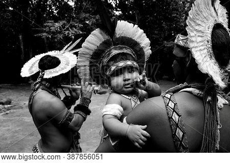 Porto Seguro, Bahia / Brazil - April 13, 2006: Pataxo Indians Are Seen In The Jaqueira Village In Th