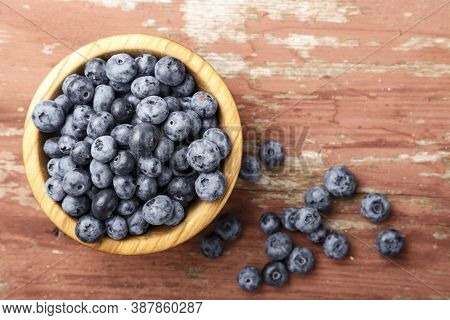 Blueberry Antioxidant Organic Superfood In A Wood Bowl Concept For Healthy Eating And Nutrition. Con
