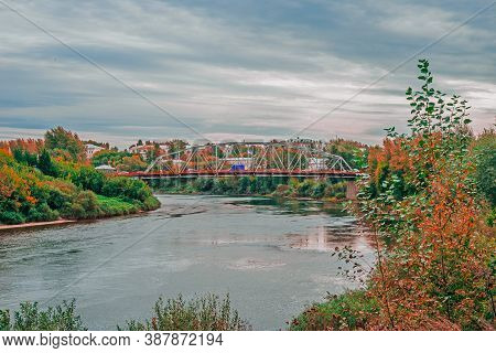 Metal Construction Of The City Bridge Across The Sylva River On A Sunny Day In Kungur, Perm Krai, Ru