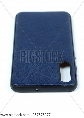 Moscow, Russia - February 22, 2020: Dark Blue Smartphone On A White Background In A Transparent Case