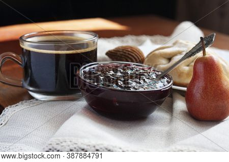 Sweet Breakfast Coffee Bun Jam Candy And Pear On A Napking