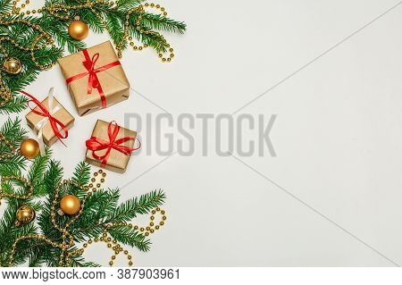 Christmas Composition, Gifts, Fir Branches, Cones, Toys. Decorations On A White Background