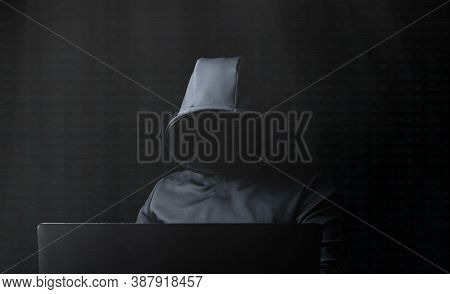 Hacker At The Computer. Darknet. Deepweb. Concept Photography.