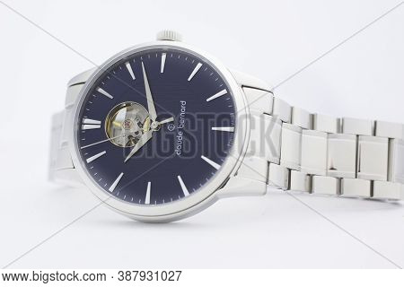 Geneve, Switzerland 01.10.2020 - Claude Bernard Man Swiss Made Mechanical Watch Metal Bracelet Isola