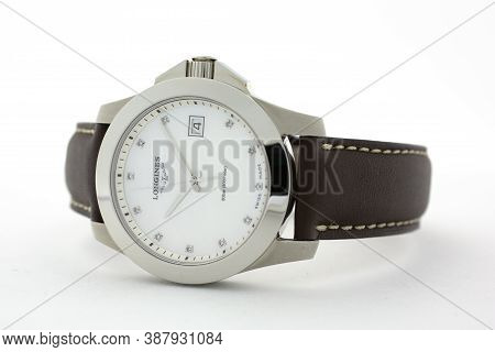 Tokyo, Japan 01.10.2020 - Swiss Made Longines Mens Wrist Watch Isolated On White. Date Function Indi