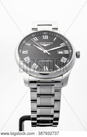 Geneve, Switzerland 01.10.2020 - Longines Mens Wrist Watch Isolated. Date Function Indicating 9. Cla