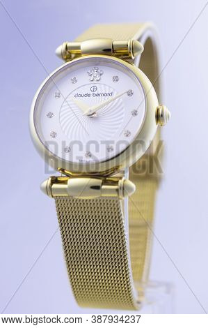 Geneve, Switzerland 01.10.2020 - Claude Bernard Woman Swiss Made Watch Gold Pvd Coating White Dial M